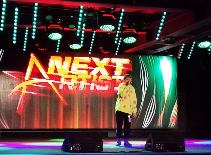 On Stage At NEXT ARTIST